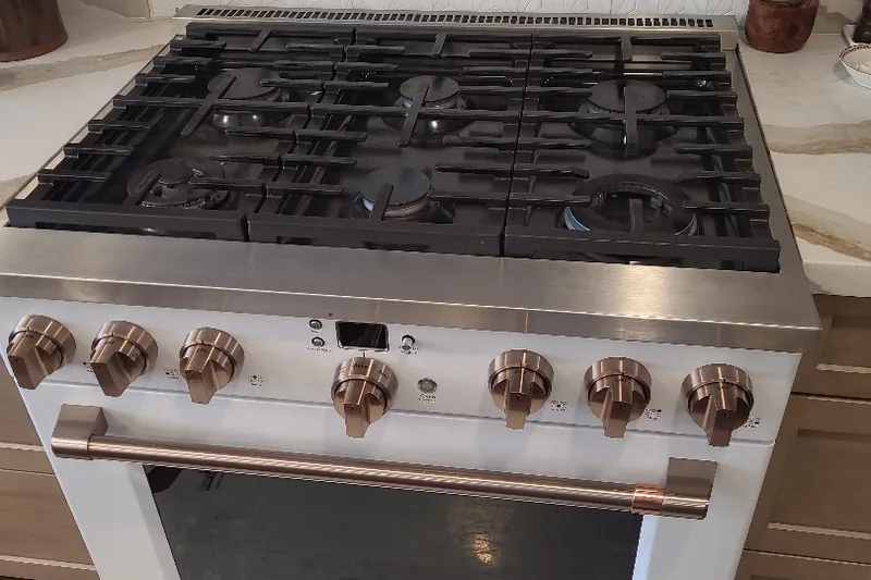 Luxury commercial-style gas cooktop burner igniter and spark module repair in Mountain View